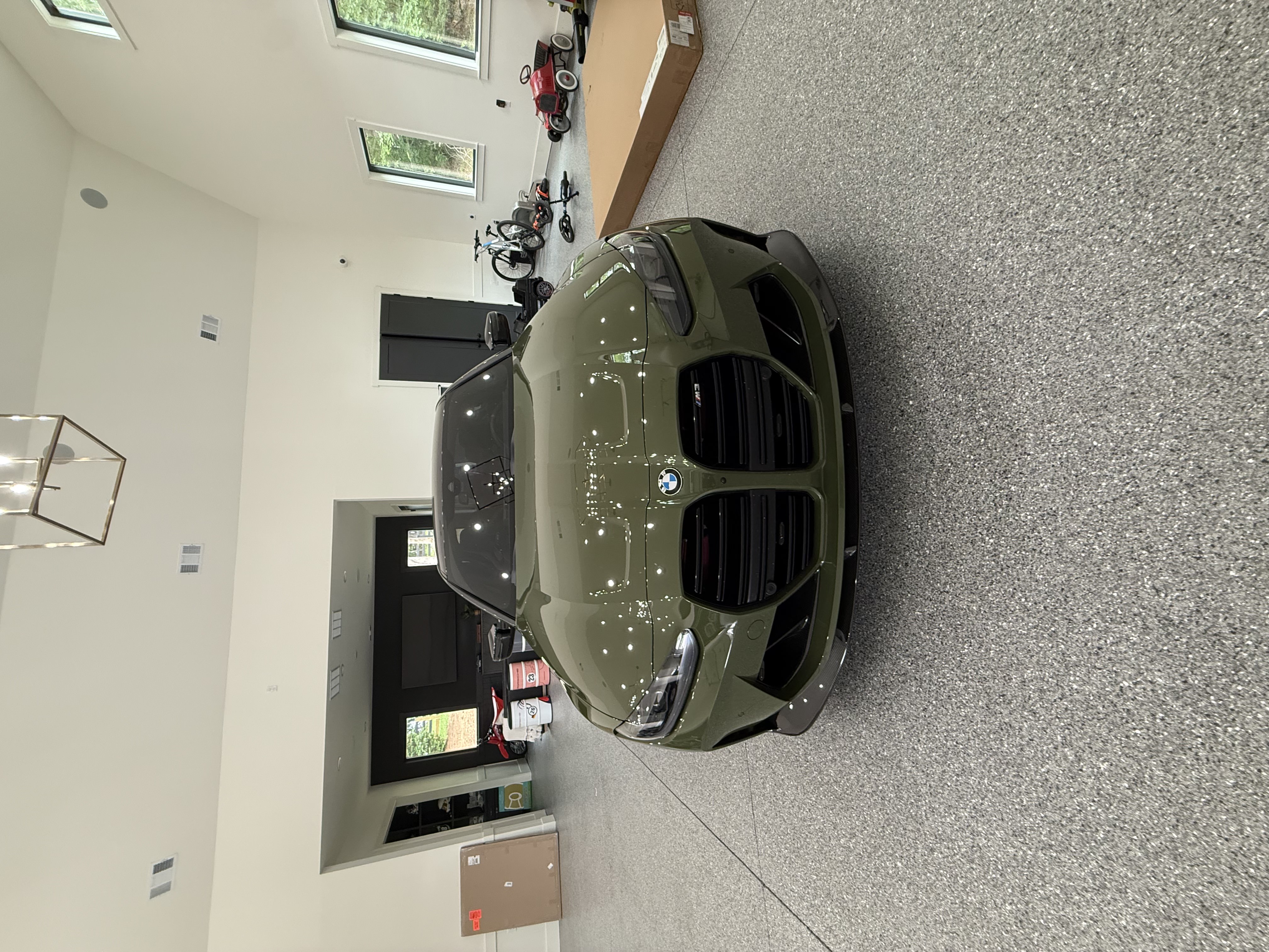 Professional ceramic coating service on luxury car in Atlanta GA