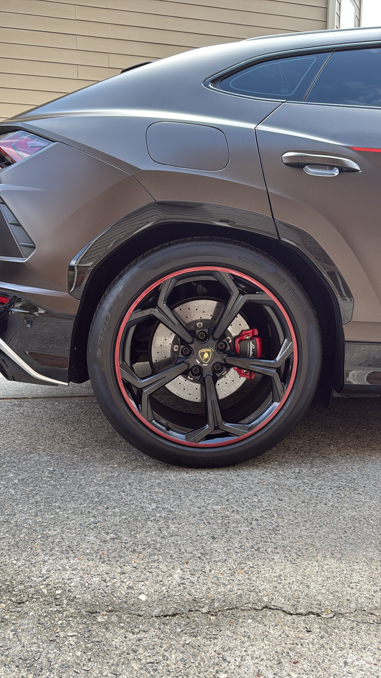 Custom wheel paint after - Lamborghini Urus red accent lip Atlanta